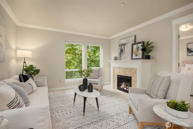 a living room with furniture fireplace and window