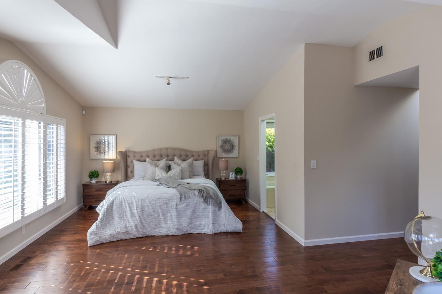 505 Preston Drive Mountain View, CA 94040 - Photo 11 of 23 a bedroom with a bed and wooden floor