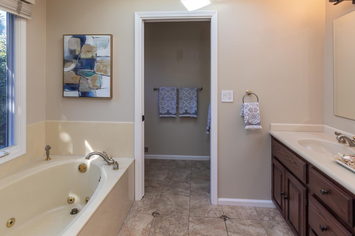 505 Preston Drive Mountain View, CA 94040 - Photo 13 of 23 a bathroom with a tub sink and mirror