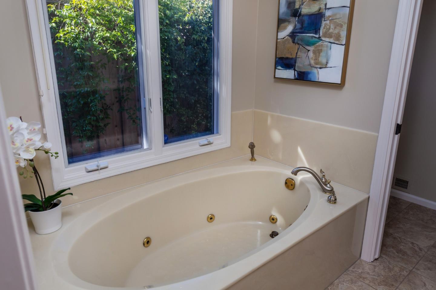 505 Preston Drive Mountain View, CA 94040 - Photo 14 of 23 a white bath tub sitting next to a shower