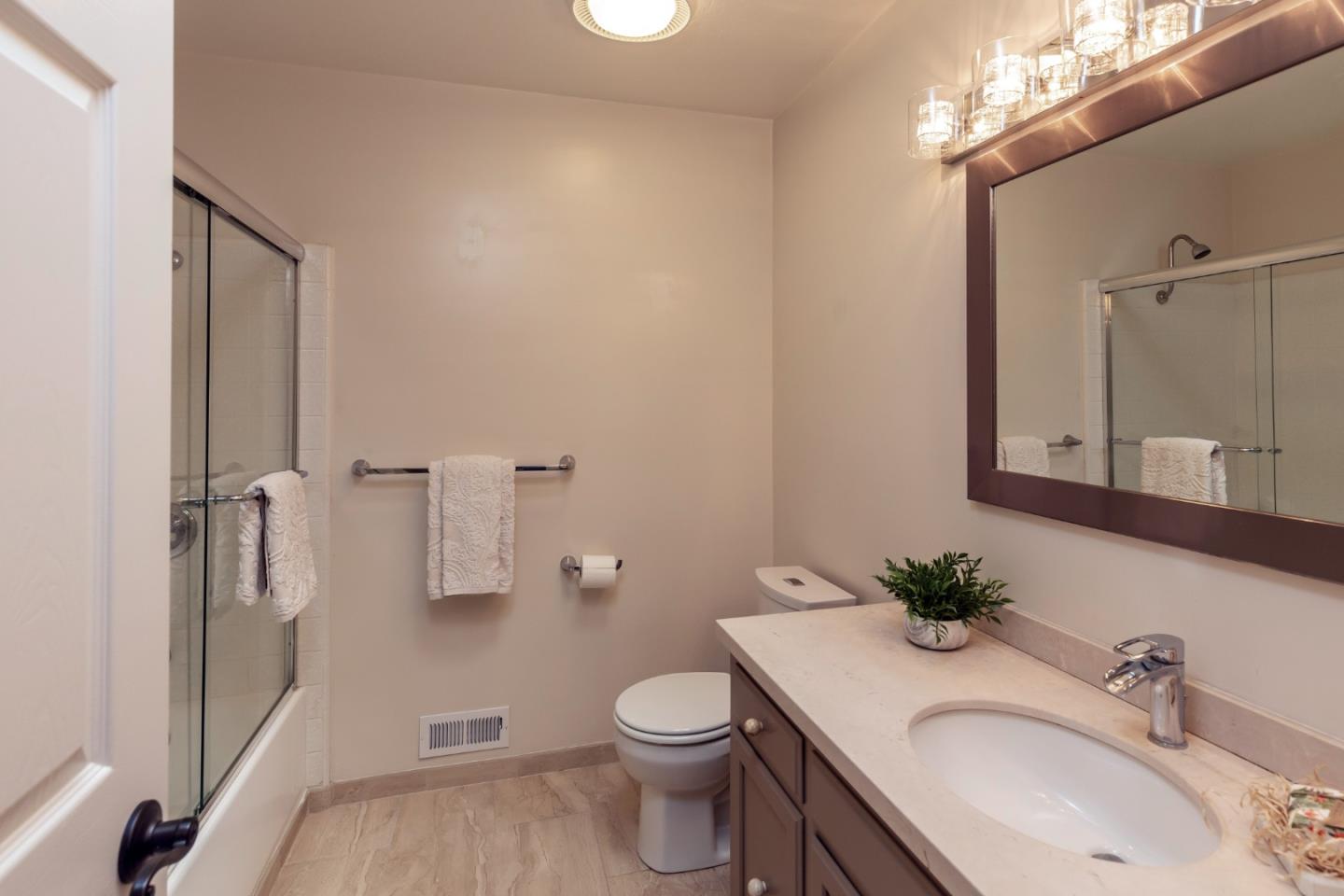 505 Preston Drive Mountain View, CA 94040 - Photo 19 of 23 a bathroom with a sink a toilet and shower