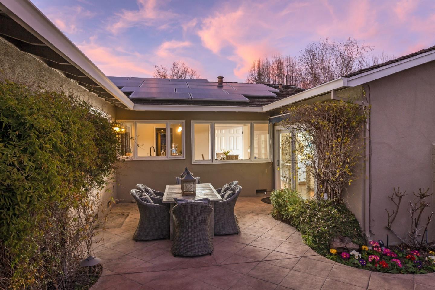 505 Preston Drive Mountain View, CA 94040 - Photo 20 of 23 a view of a patio with couches table and chairs and potted plants