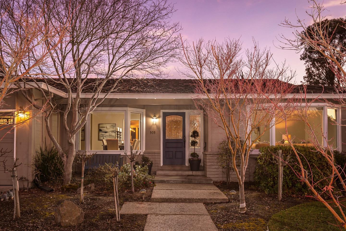 505 Preston Drive Mountain View, CA 94040 - Photo 2 of 23 a view of a house with a yard covered with snow