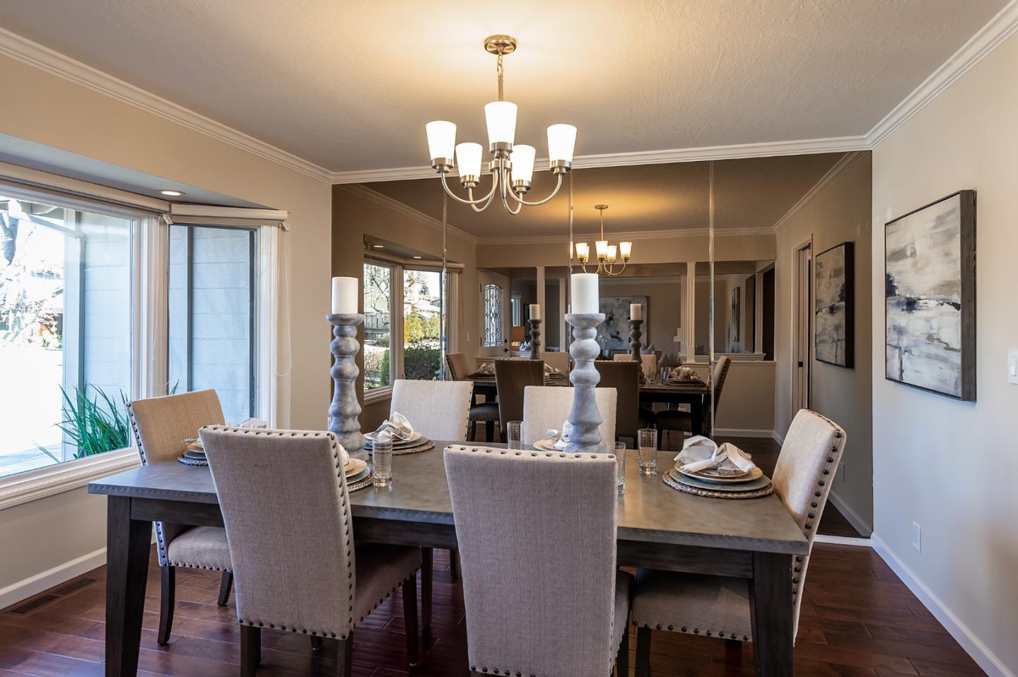 505 Preston Drive Mountain View, CA 94040 - Photo 6 of 23 a view of a dining room with furniture a chandelier and wooden floor