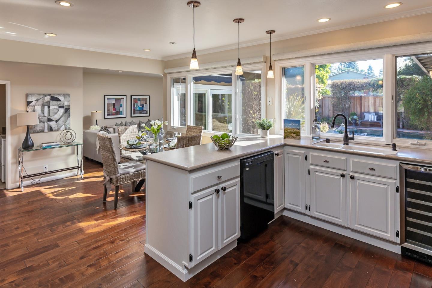 505 Preston Drive Mountain View, CA 94040 - Photo 8 of 23 a kitchen with a sink stove and wooden floor