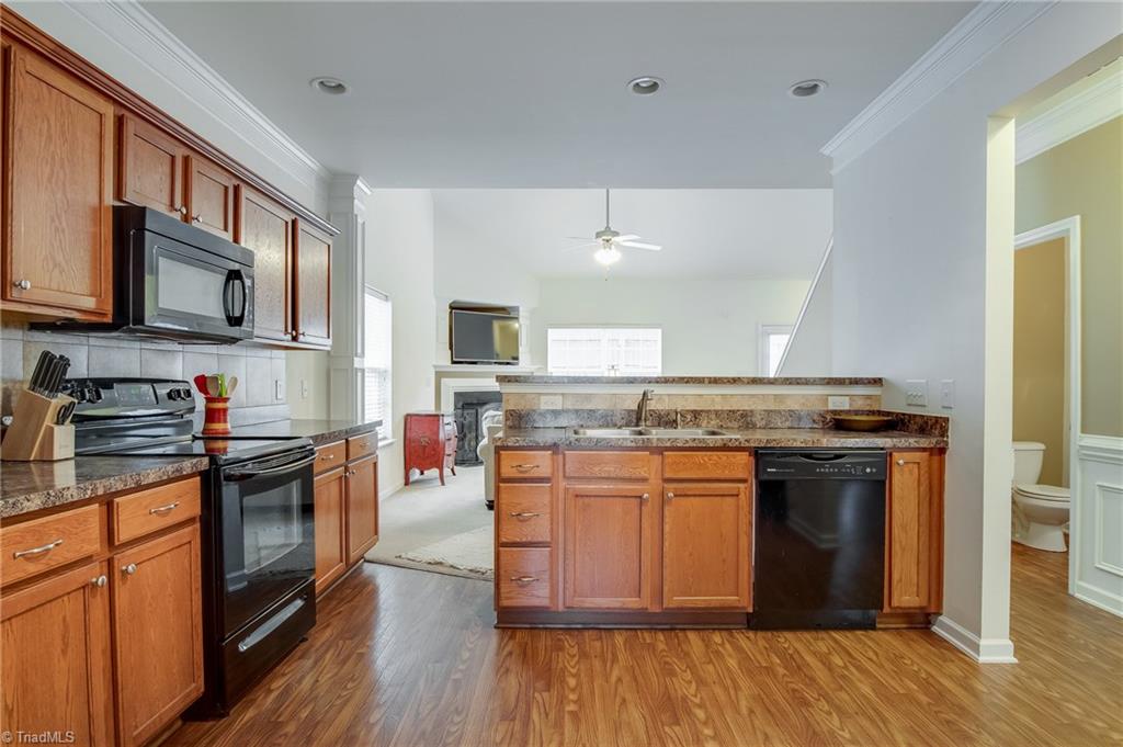 725 Spinning Wheel Point High Point, NC 27265 - Photo 5 of 27 Tons of cabinet/counter space in this kitchen with plenty of room for a floating island and open to the great room.