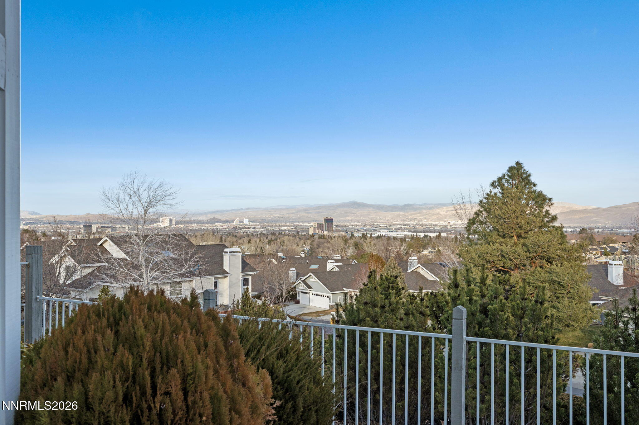 6186 Squires Lane Reno, NV 89519 - Photo 45 of 57 a view of a city with tall buildings in background