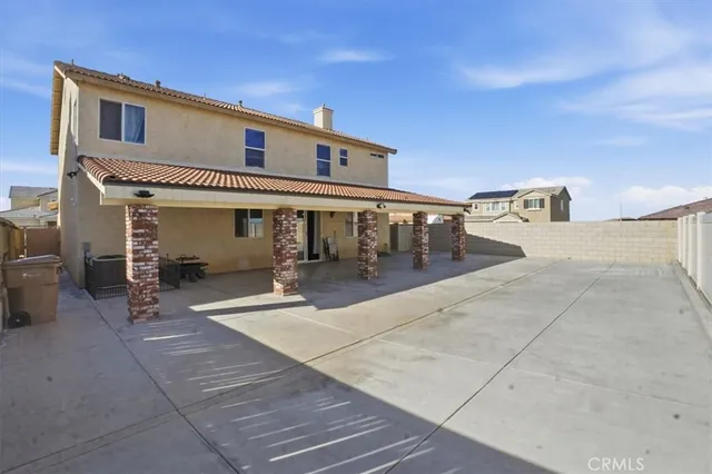 a view of a house with a patio