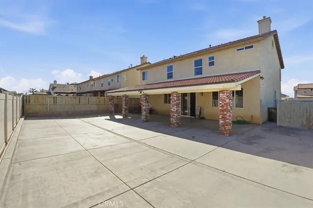 an aerial view of residential building with parking space