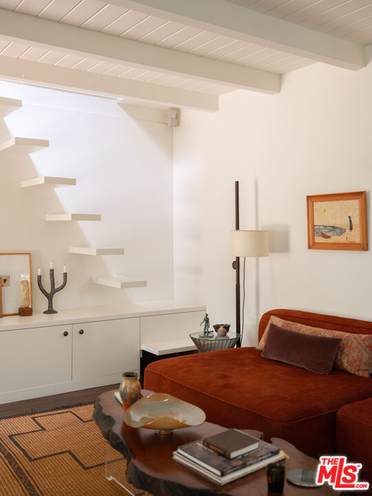 1452 Westerly Terrace Los Angeles, CA 90026 - Photo 13 of 39 a bedroom with a bed and a cabinets