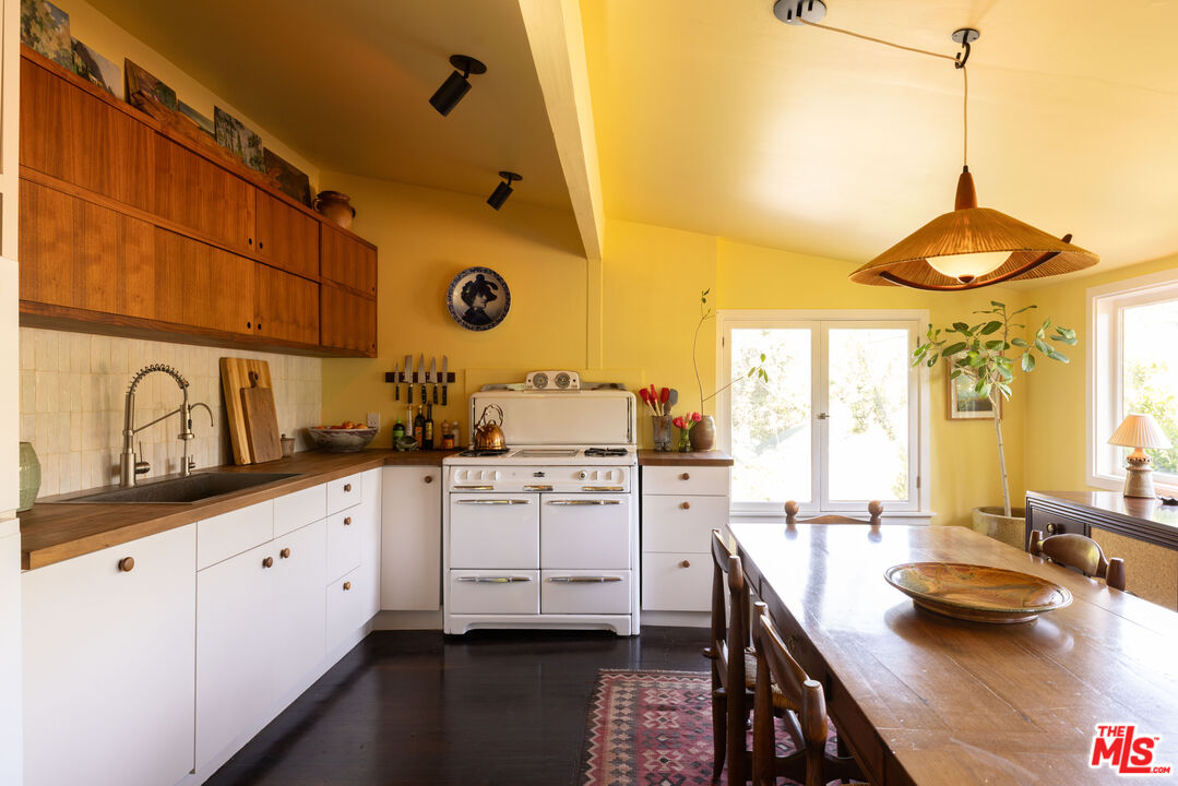 1452 Westerly Terrace Los Angeles, CA 90026 - Photo 20 of 39 a kitchen with white cabinets and sink