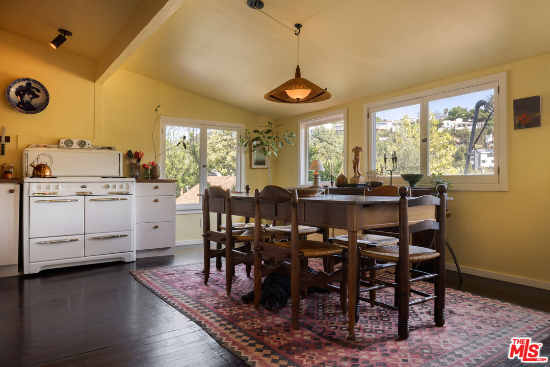1452 Westerly Terrace Los Angeles, CA 90026 - Photo 25 of 39 a view of a dining room with furniture window and wooden floor