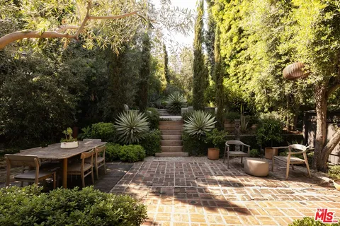 a view of a table and chairs in patio