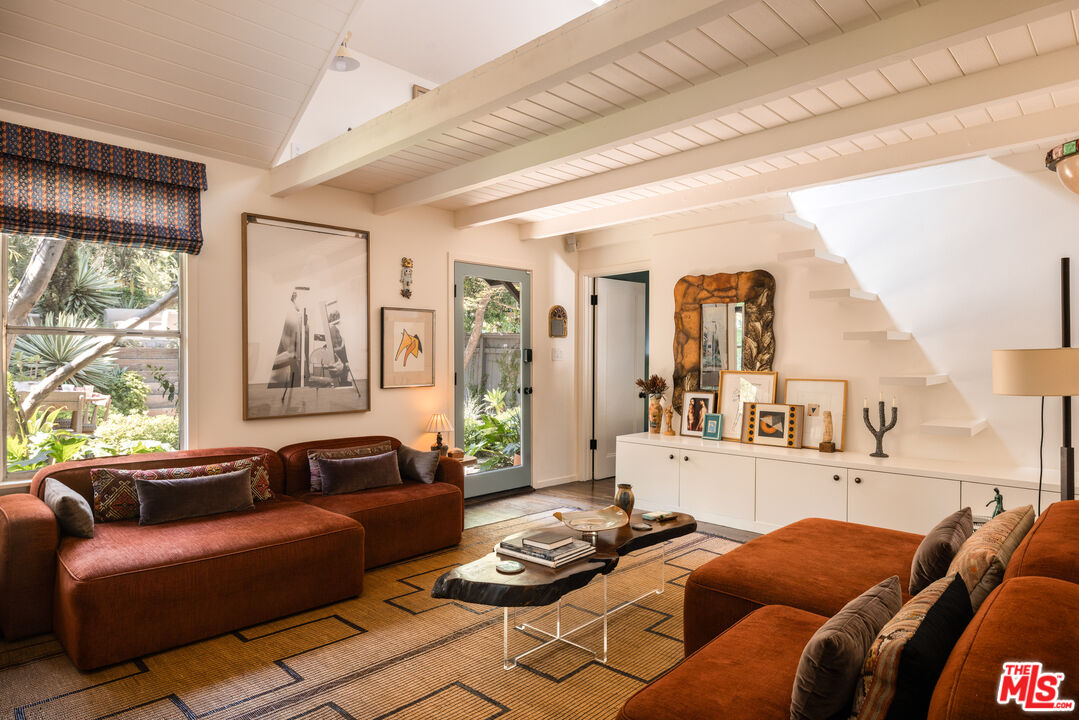 1452 Westerly Terrace Los Angeles, CA 90026 - Photo 3 of 39 a living room with furniture and a large window
