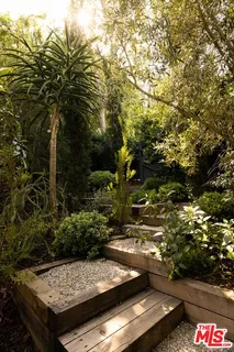 a view of an outdoor space with sitting area