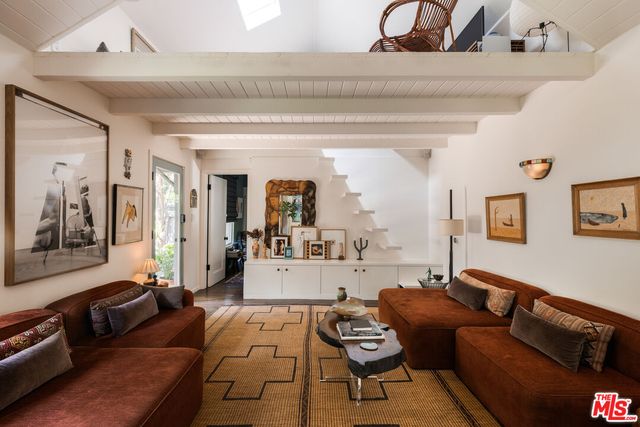 a living room with furniture and a couch