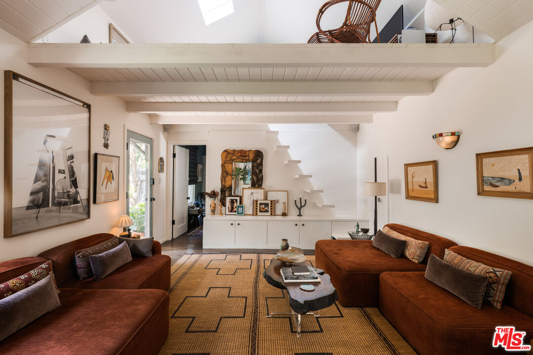 1452 Westerly Terrace Los Angeles, CA 90026 - Photo 5 of 39 a living room with furniture and a couch
