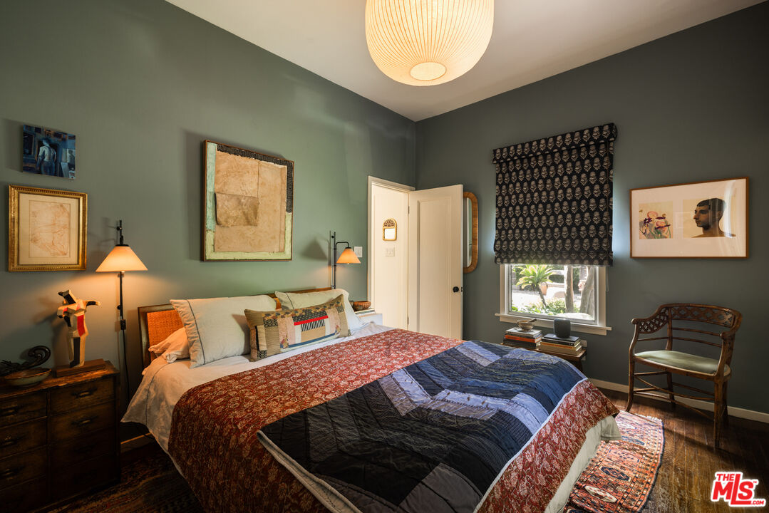 1452 Westerly Terrace Los Angeles, CA 90026 - Photo 7 of 39 a bedroom with a bed and dresser