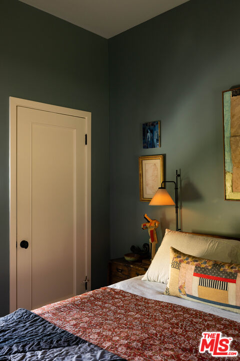 1452 Westerly Terrace Los Angeles, CA 90026 - Photo 10 of 39 a bedroom with a bed and a table in it