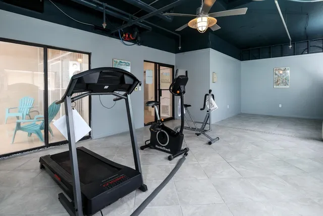 a view of a room with gym equipment