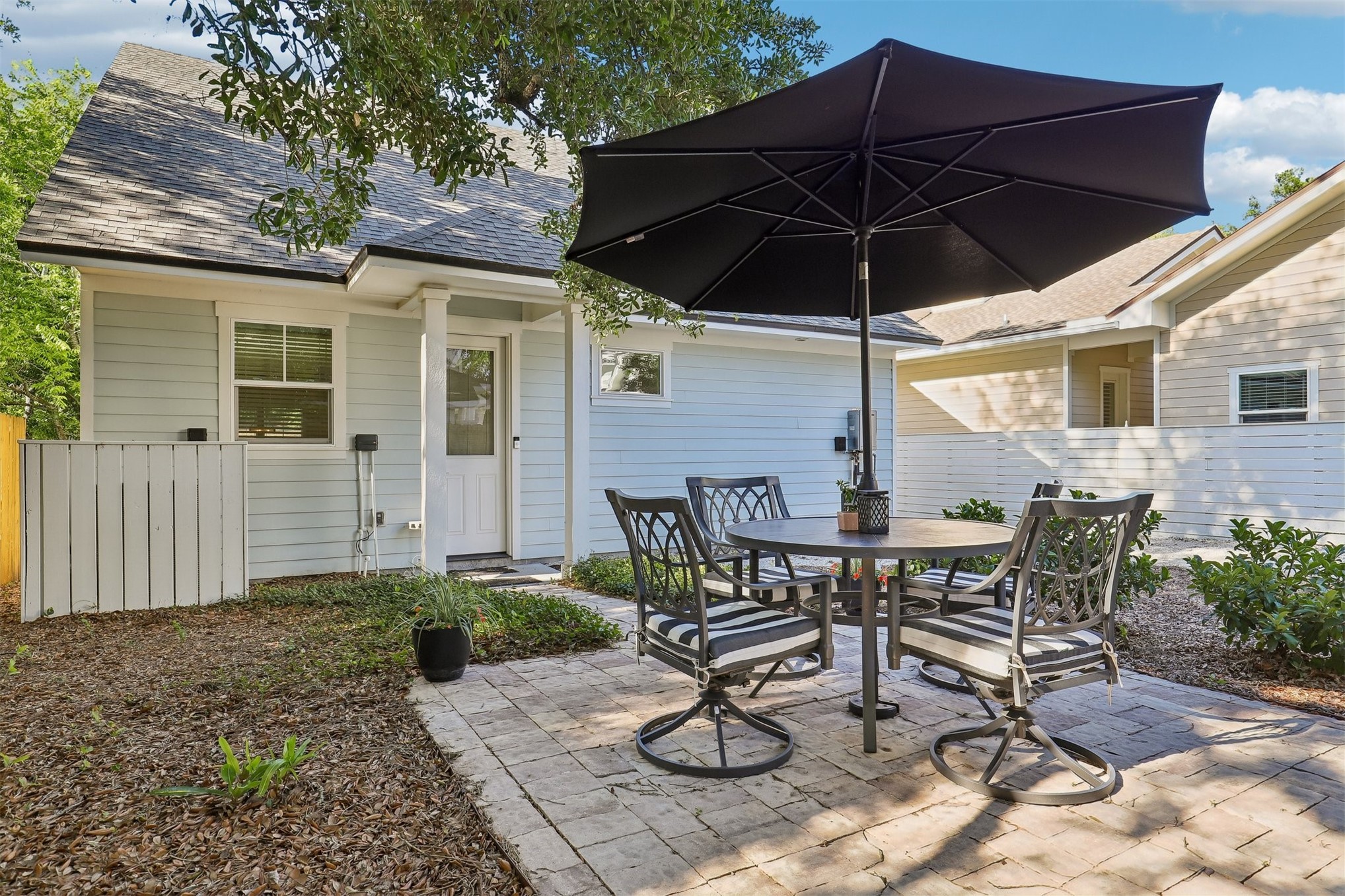 1012 White Street Fernandina Beach, FL 32034 - Photo 32 of 35 a view of a backyard with furniture and backyard