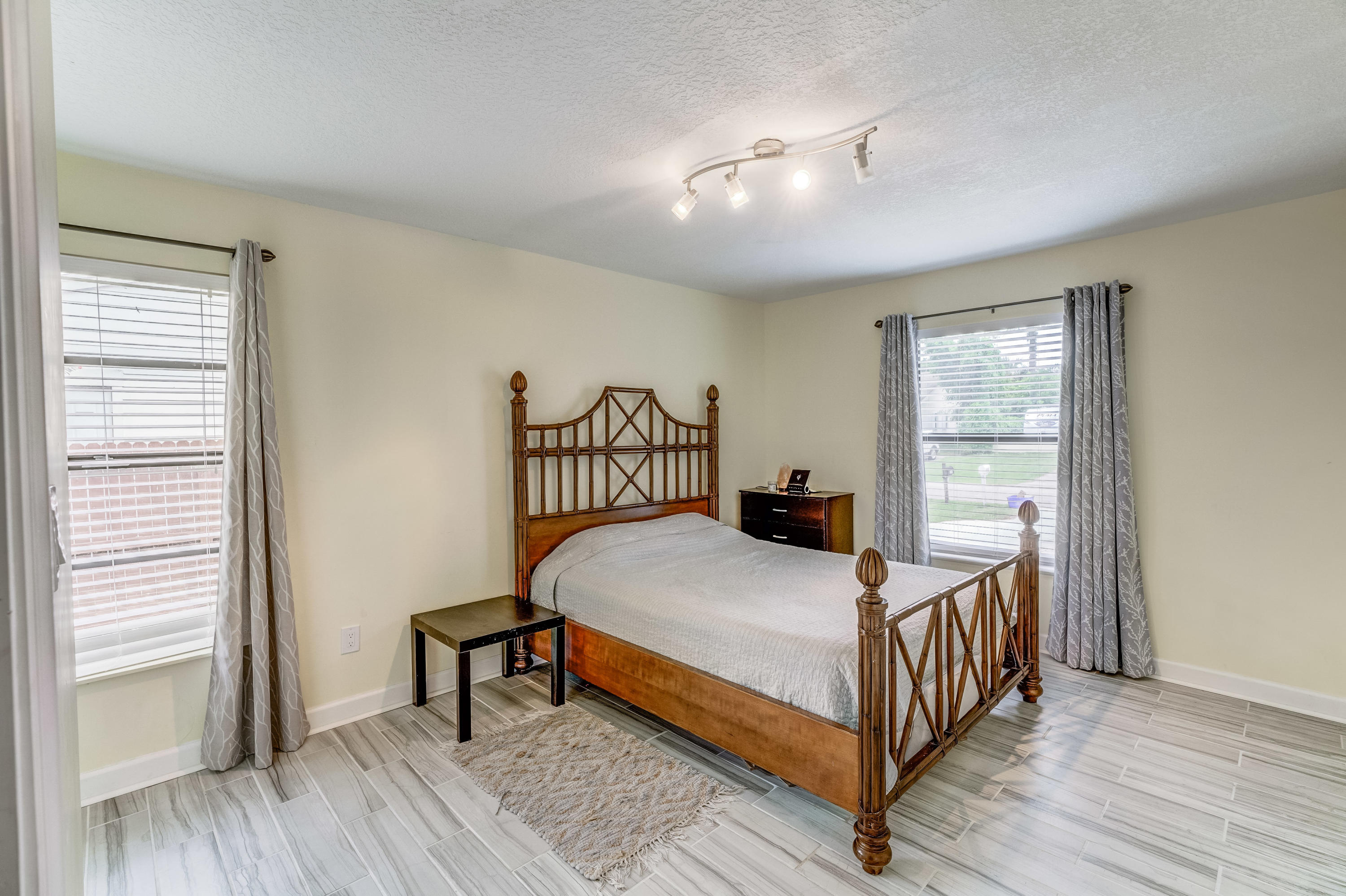 6120 Wolfe Street Jupiter, FL 33458 - Photo 21 of 55 Guest Bedroom and bamboo floors