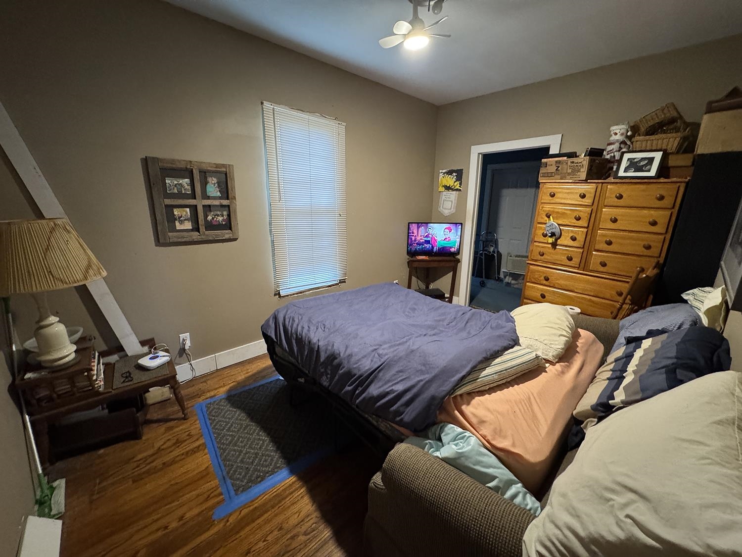 27375 Highway 40 Chadwick, IL 61014 - Photo 19 of 39 a bedroom with furniture and a wooden floor