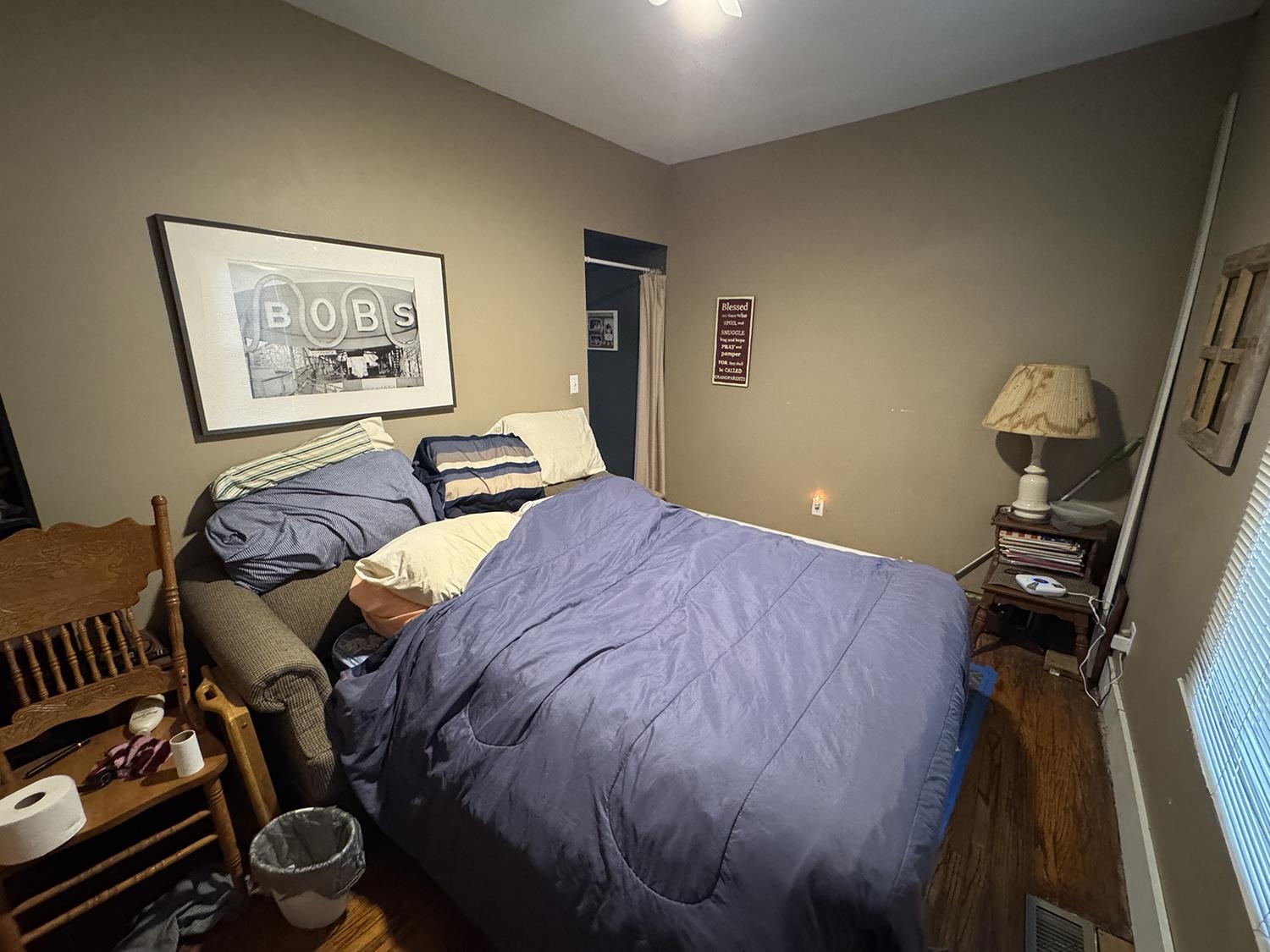 27375 Highway 40 Chadwick, IL 61014 - Photo 20 of 39 a bedroom with a bed and a dresser