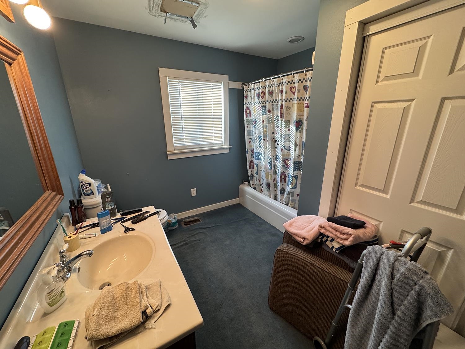 27375 Highway 40 Chadwick, IL 61014 - Photo 21 of 39 a bed sitting in a bedroom next to a window
