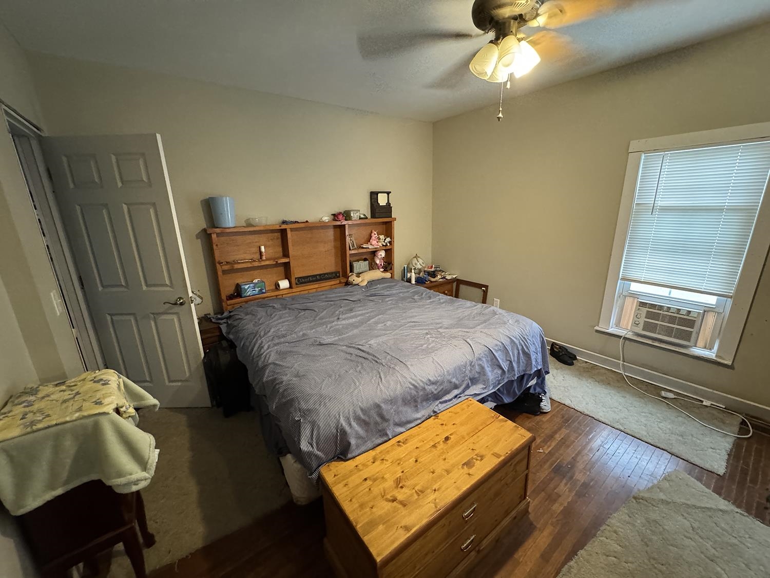 27375 Highway 40 Chadwick, IL 61014 - Photo 24 of 39 a bedroom with a bed and wooden floor
