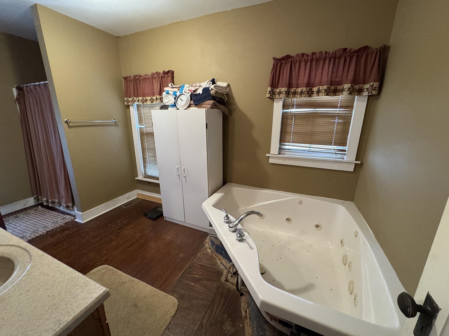 27375 Highway 40 Chadwick, IL 61014 - Photo 26 of 39 a bedroom with a bed and wooden floor