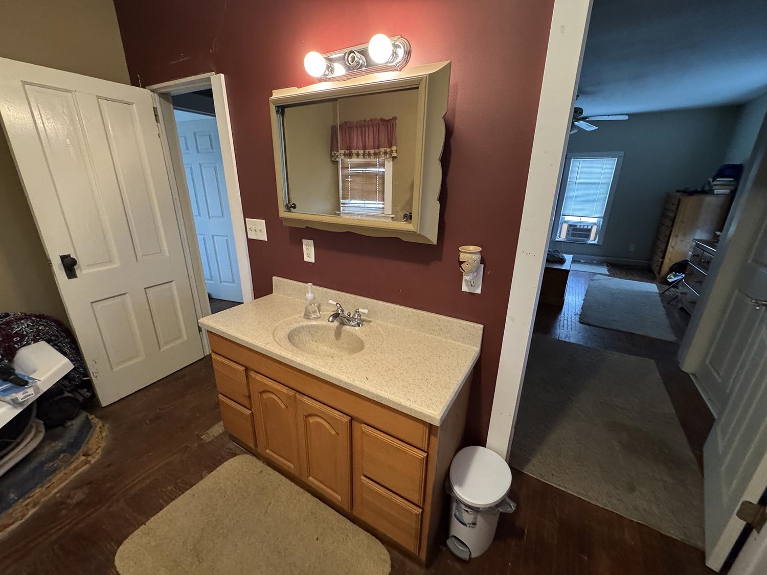 27375 Highway 40 Chadwick, IL 61014 - Photo 27 of 39 a bathroom with a sink toilet and mirror