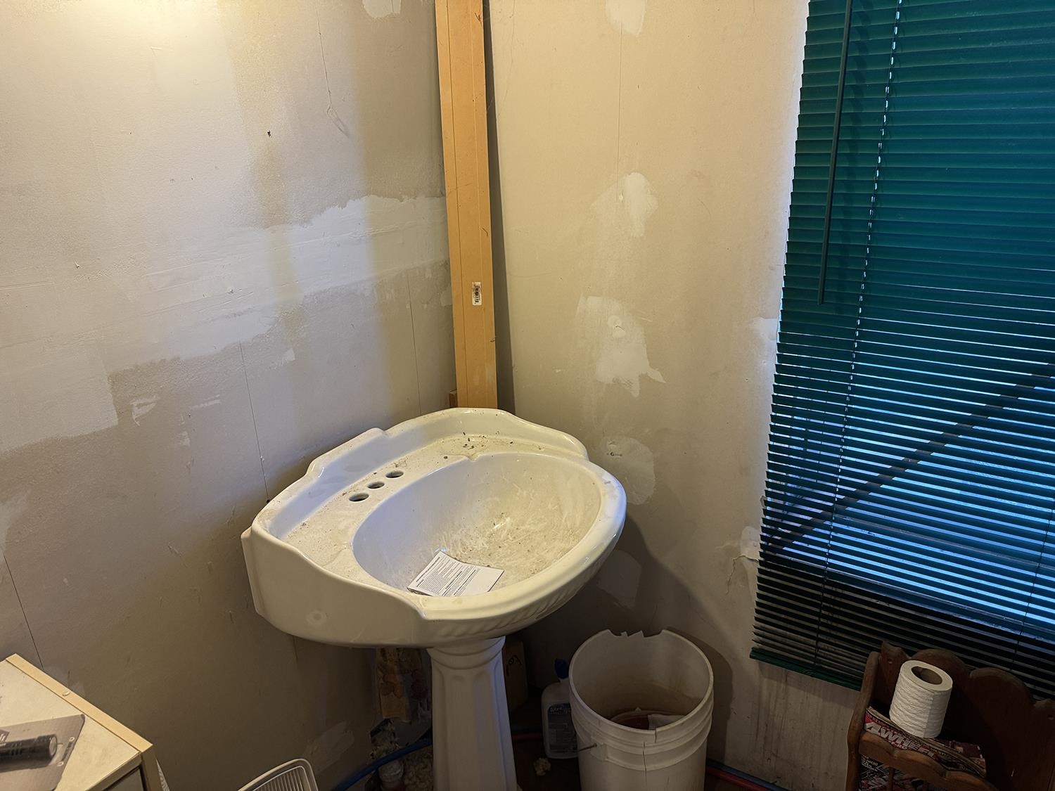 27375 Highway 40 Chadwick, IL 61014 - Photo 33 of 39 a bathroom with a toilet a sink and mirror