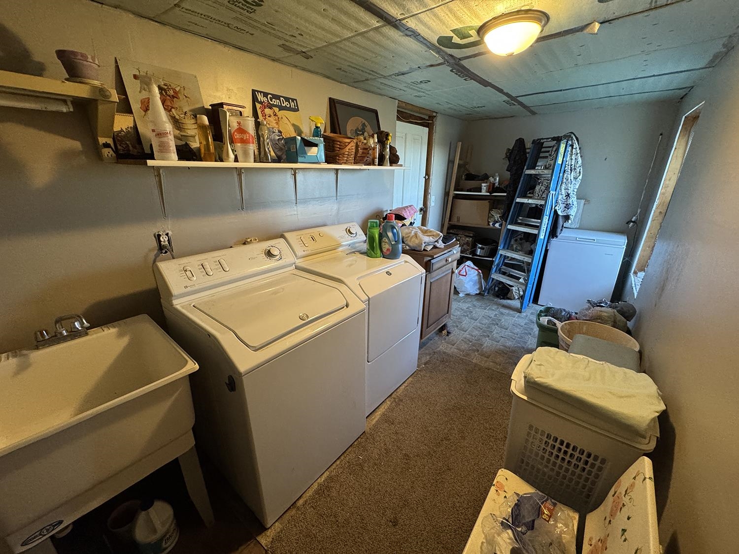 27375 Highway 40 Chadwick, IL 61014 - Photo 34 of 39 a utility room with dryer washer and a view of living room