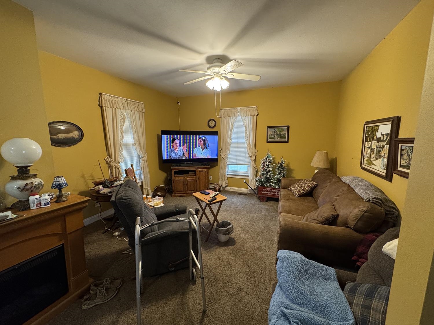 27375 Highway 40 Chadwick, IL 61014 - Photo 9 of 39 a living room with furniture and a flat screen tv