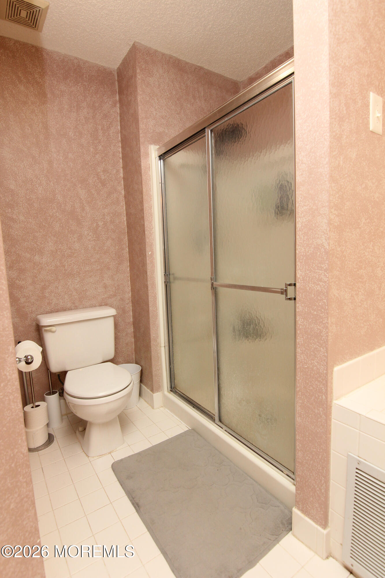 33 Austin Street Tinton Falls, NJ 07712 - Photo 13 of 46 a bathroom with a toilet and a shower