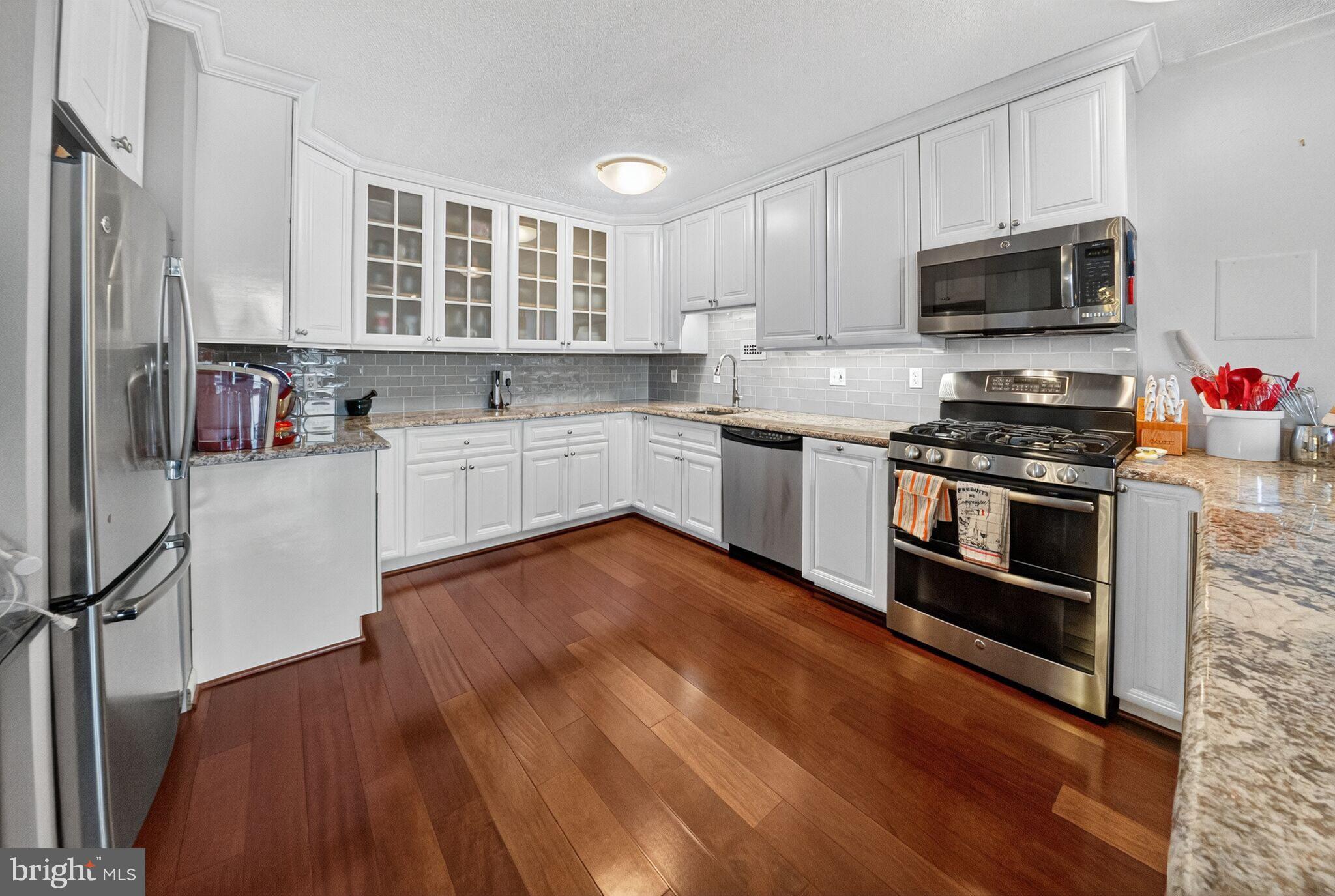 4242 East-West Highway, Unit 714 Chevy Chase, MD 20815 - Photo 9 of 29 Renovated Kitchen with stainless steel appliances