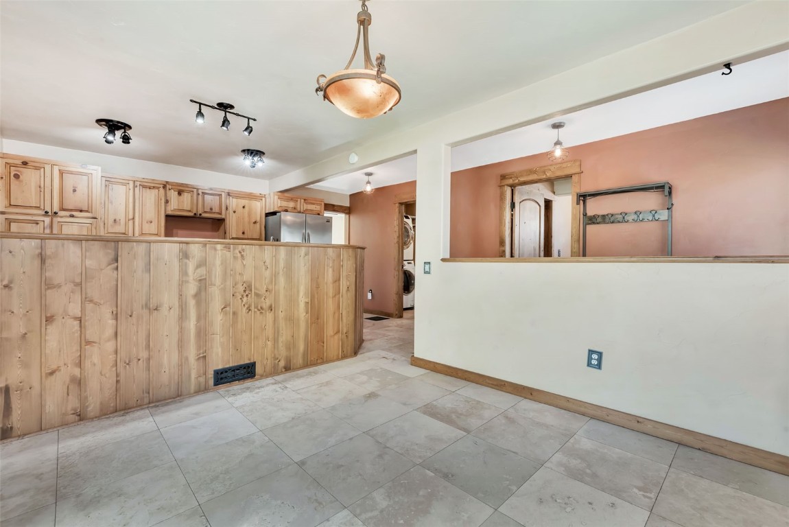 21505 4th Avenue Phippsburg, CO 80469 - Photo 20 of 44 a view of a livingroom with wooden cabinets