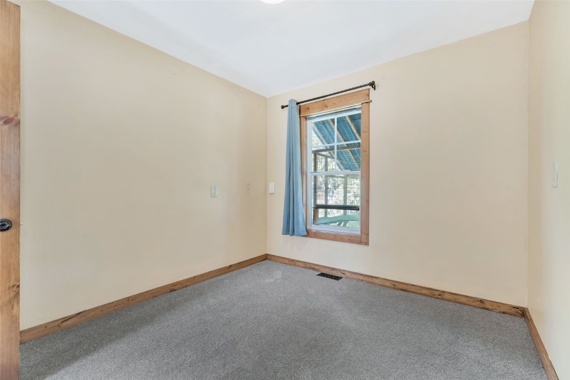 21505 4th Avenue Phippsburg, CO 80469 - Photo 28 of 44 an empty room with windows
