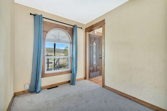 a view of a room with front door