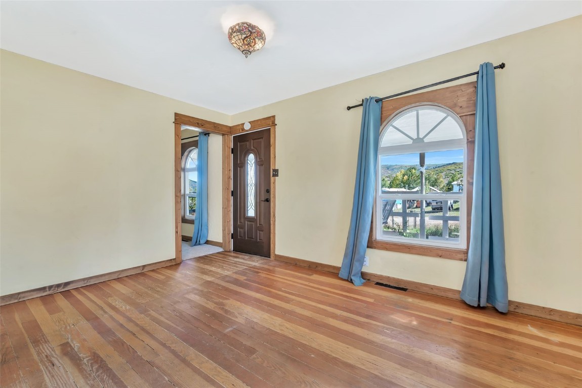 21505 4th Avenue Phippsburg, CO 80469 - Photo 6 of 44 a view of an empty room with a window