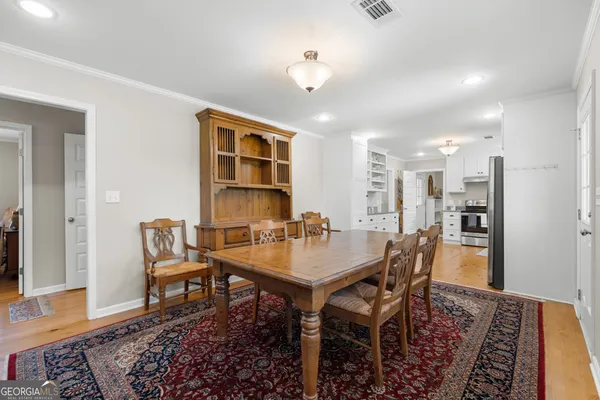 a view of a dining room with furniture