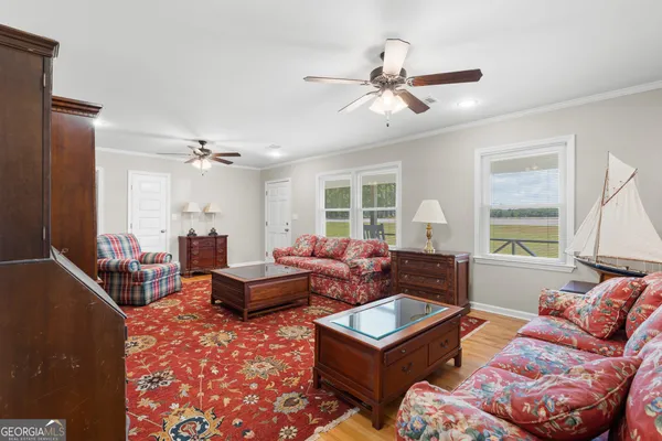 a living room with furniture and a window