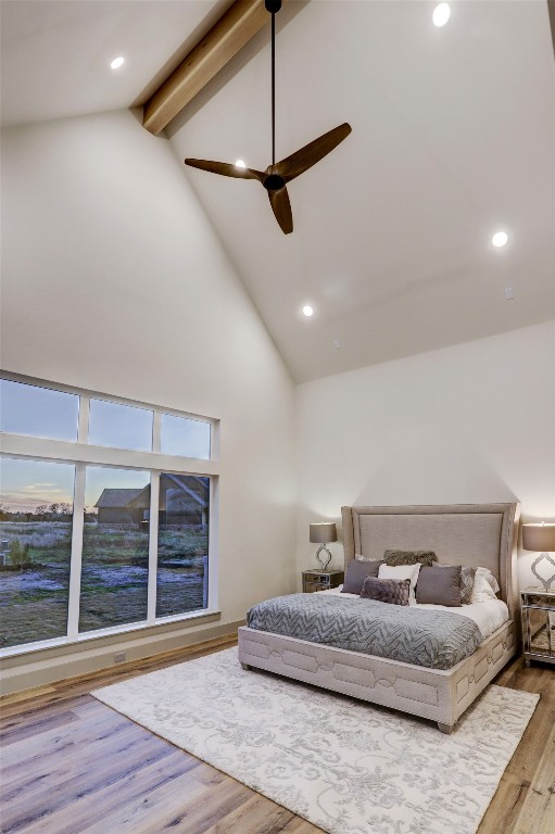 104 Turney Trace Round Top, TX 78954 - Photo 12 of 17 a spacious bedroom with a bed and window