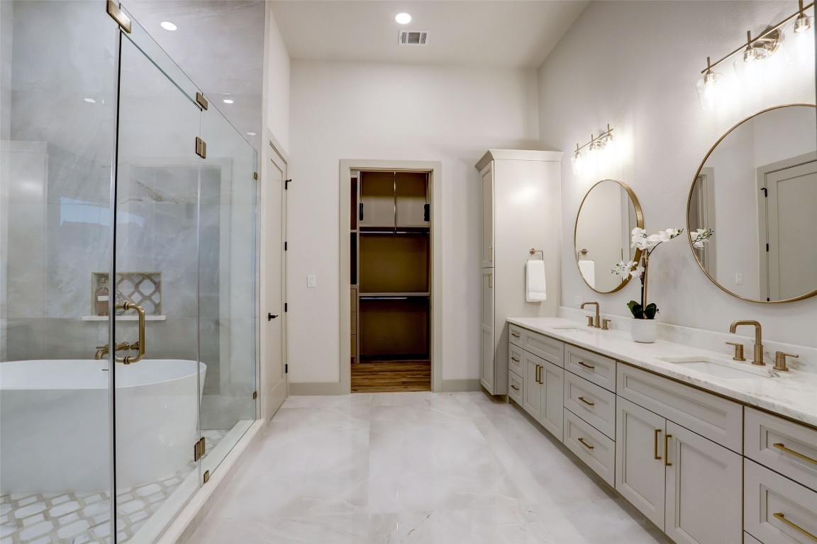 104 Turney Trace Round Top, TX 78954 - Photo 14 of 17 a spacious bathroom with a double vanity sink mirror and double