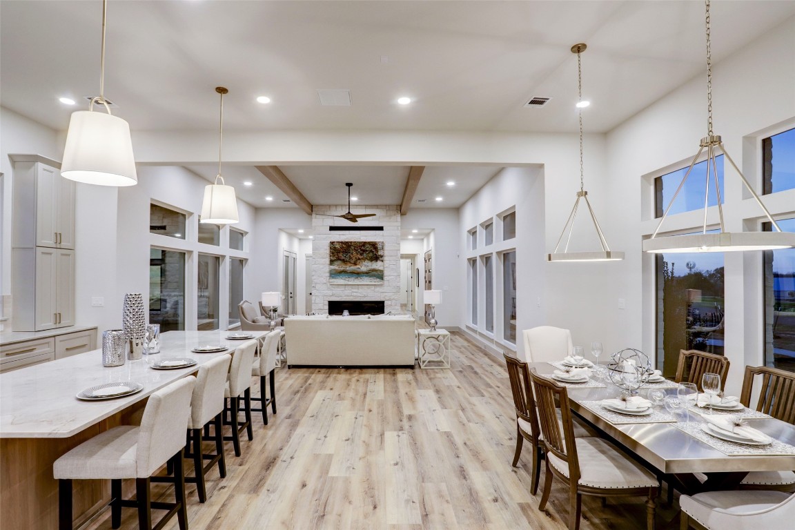 104 Turney Trace Round Top, TX 78954 - Photo 9 of 17 a large kitchen with a table and chairs