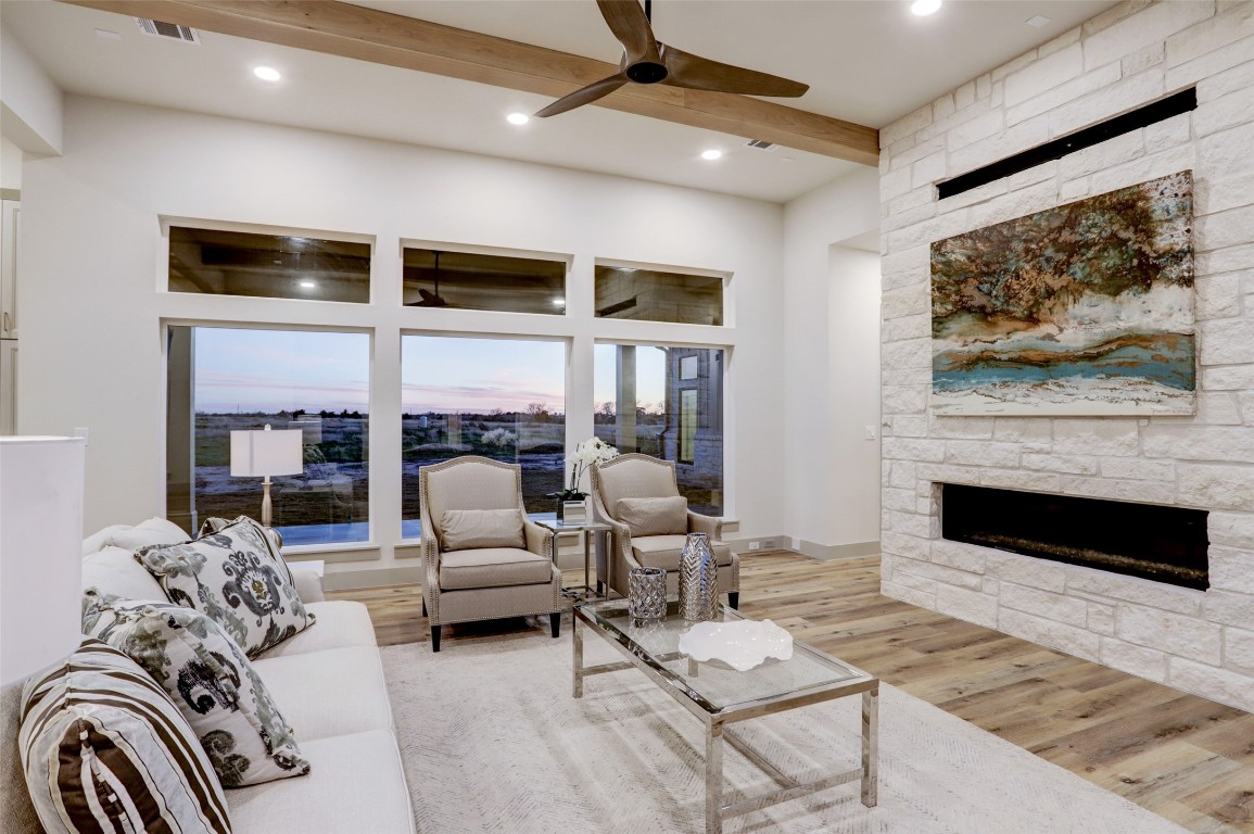 104 Turney Trace Round Top, TX 78954 - Photo 10 of 17 a living room with furniture fireplace and flat screen tv