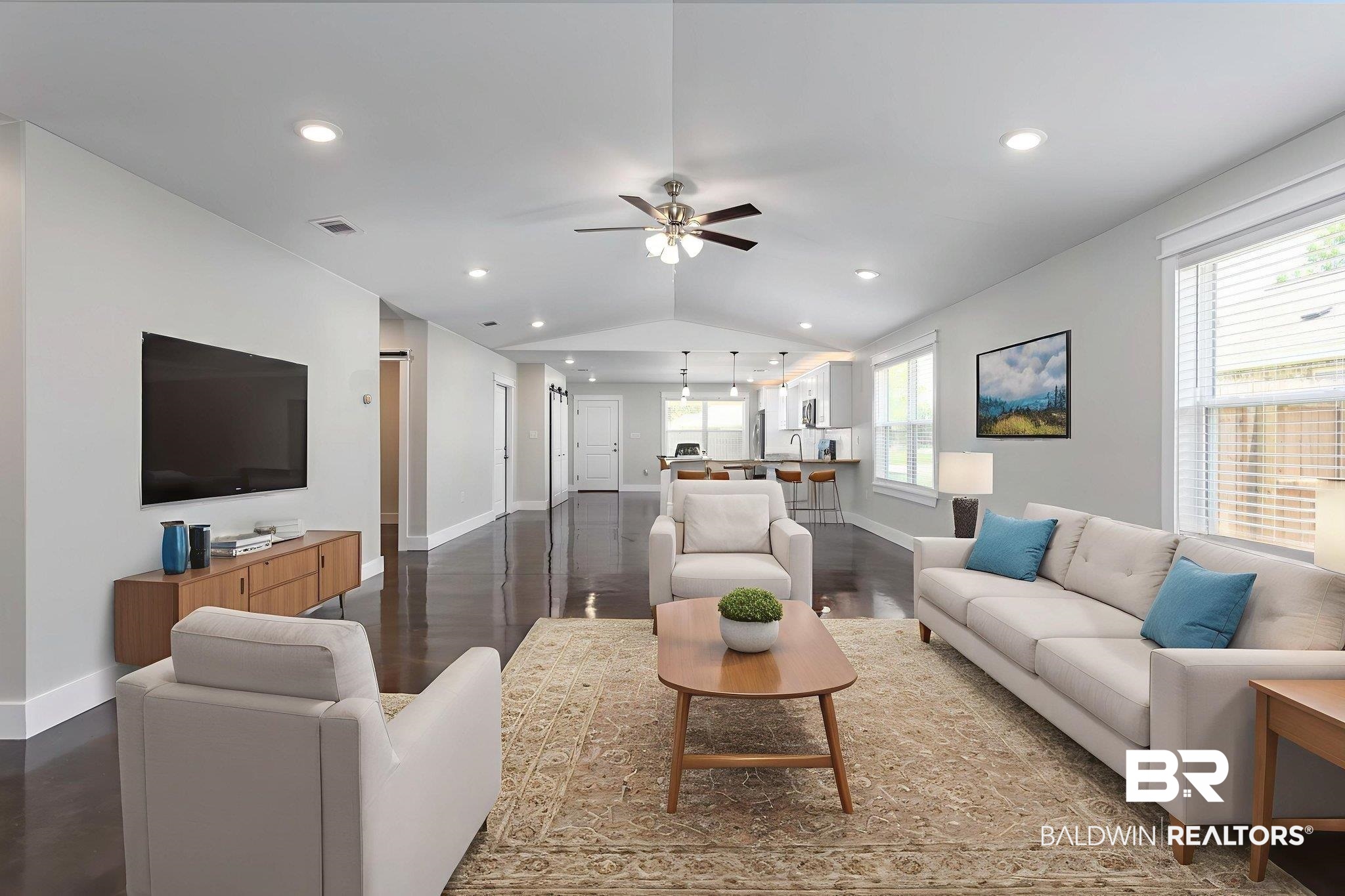 17126 Sugar Loop Foley, AL 36535 - Photo 6 of 28 Living area featuring ceiling fan, dark wood finished floors, vaulted ceiling, and recessed lighting