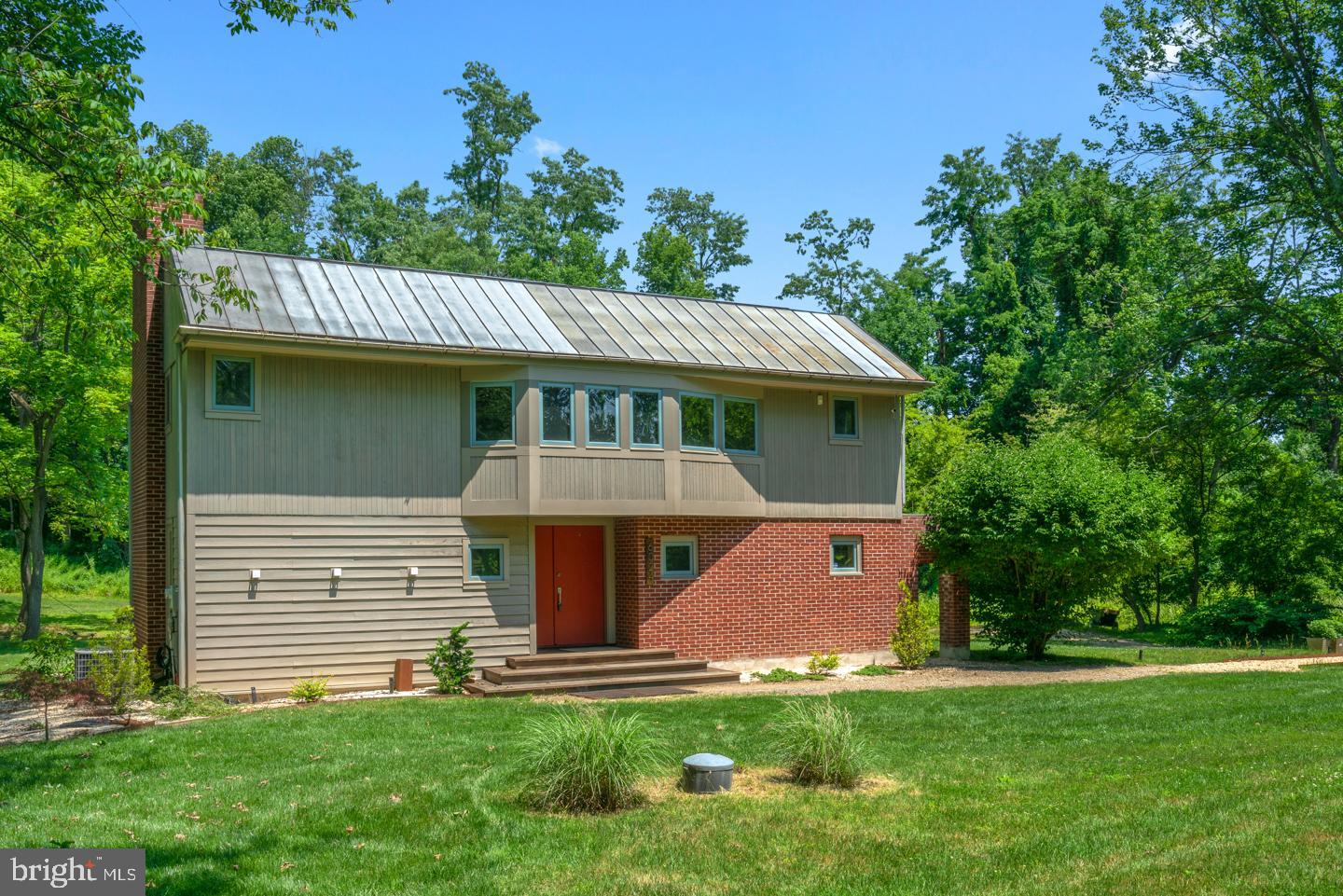 6024 Goshen Road Newtown Square, PA 19073 - Photo 15 of 15 a front view of a house with a yard