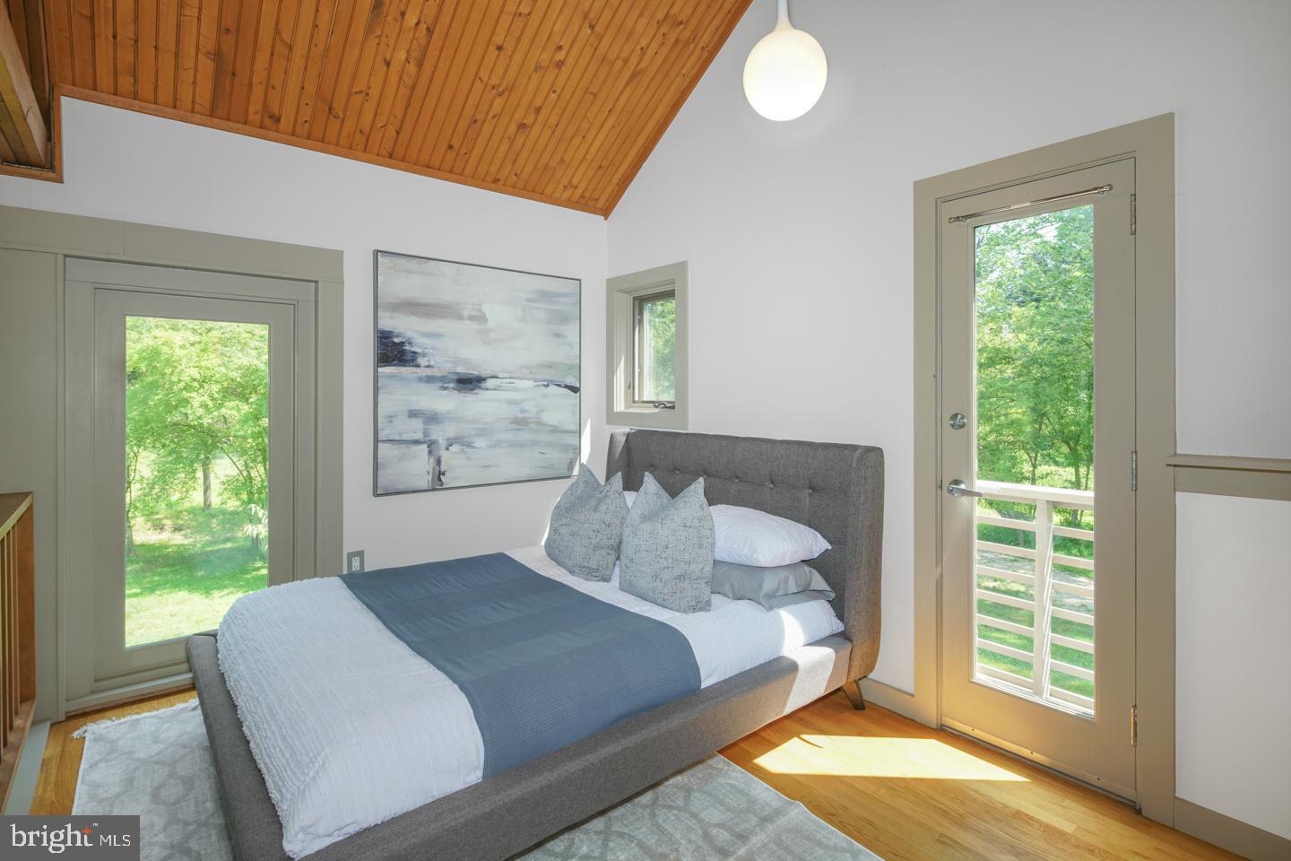 6024 Goshen Road Newtown Square, PA 19073 - Photo 9 of 15 a bedroom with a large bed and a window